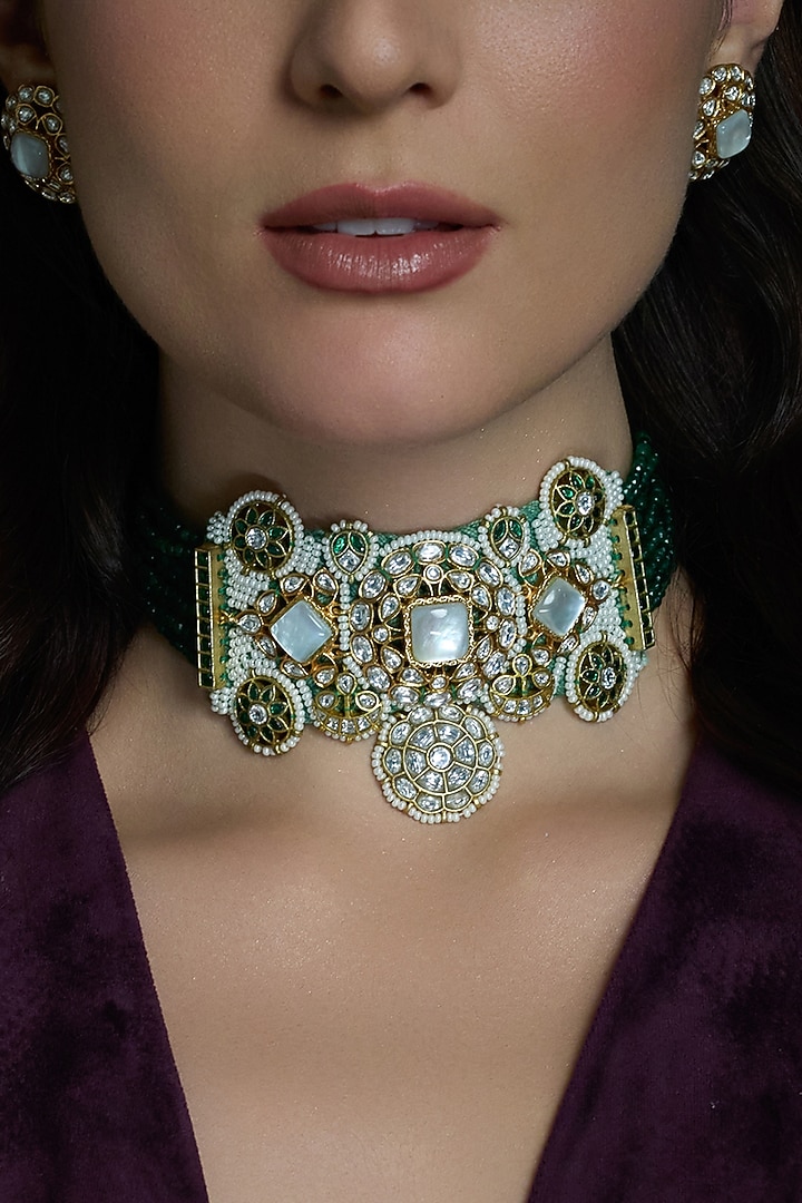Gold Finish Emerald Stone Choker Necklace Set by Joules By Radhika at Pernia's Pop Up Shop