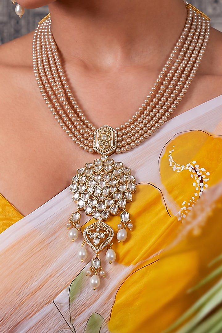 Gold Finish Kundan Polki & White Beaded Pendant Necklace Set by Joules By Radhika at Pernia's Pop Up Shop