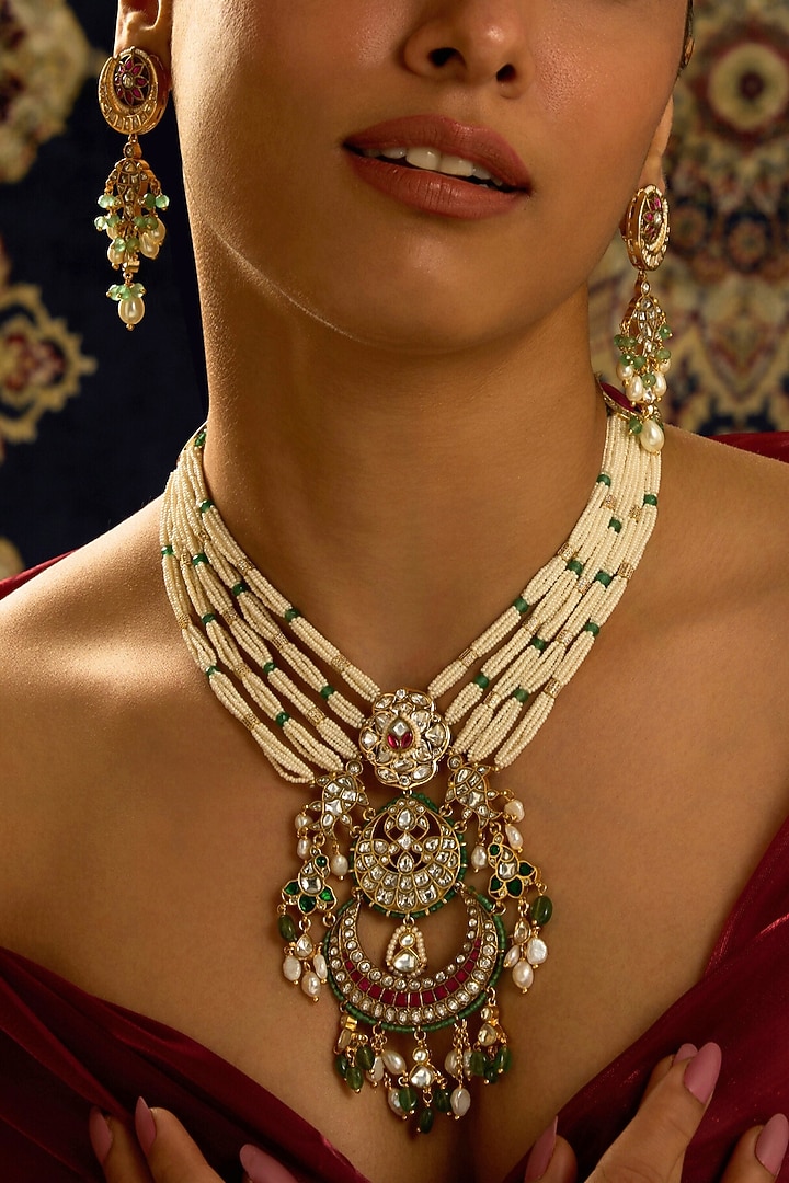 Gold Finish Rajwadi Motifs & Multi-Colored Stone Long Necklace by Joules By Radhika at Pernia's Pop Up Shop
