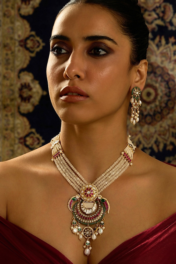 Gold Finish Rajwadi Motifs & Multi-Colored Stone Necklace Set by Joules By Radhika at Pernia's Pop Up Shop