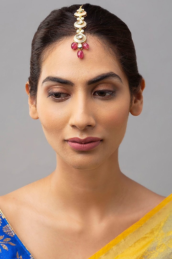Gold Finish Maang Tikka With Red Onyx Drops by Joules By Radhika