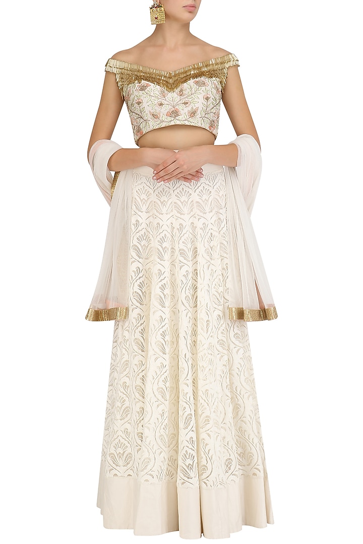 Ivory tassel embroidered crop top and skirt set available only at Pernia's Pop Up Shop.