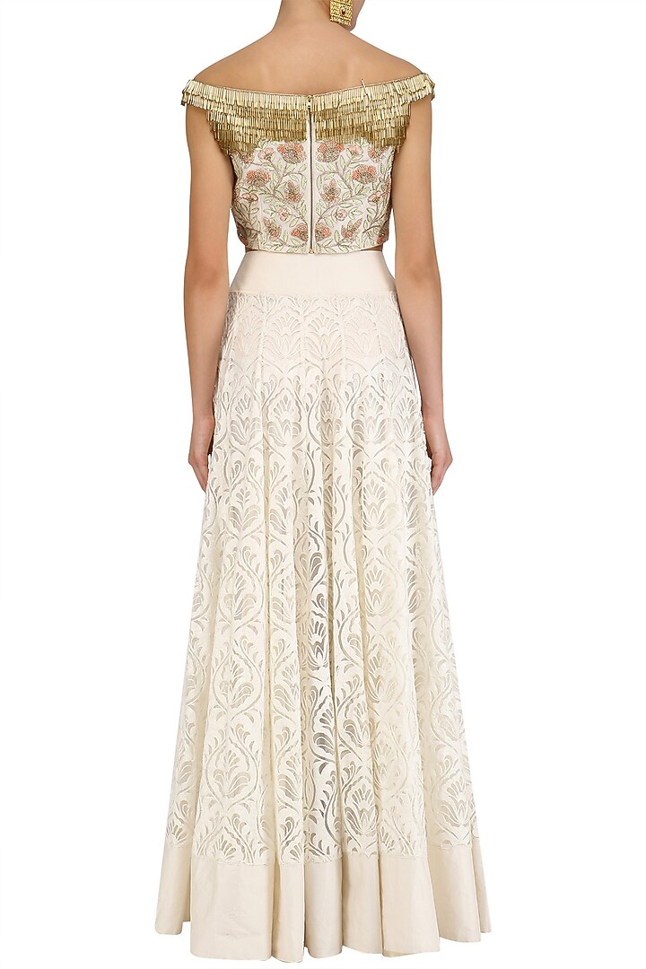 Ivory tassel embroidered crop top and skirt set available only at Pernia's Pop Up Shop.