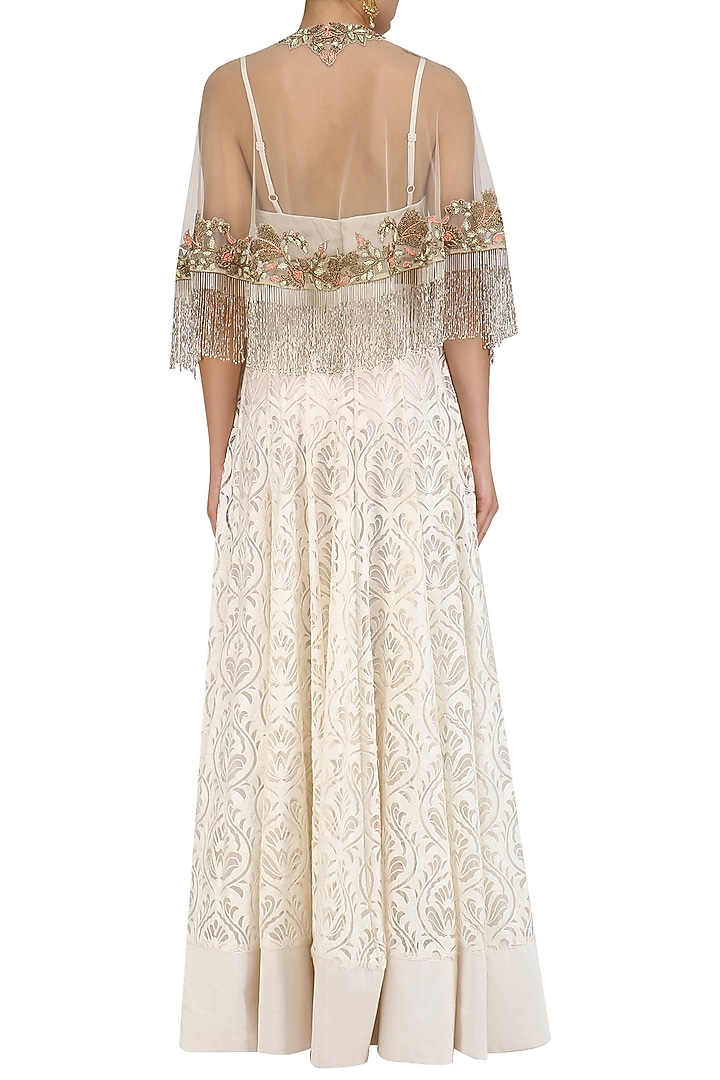 Ivory floral embroidered cape and peach skirt set available only at Pernia's Pop Up Shop.