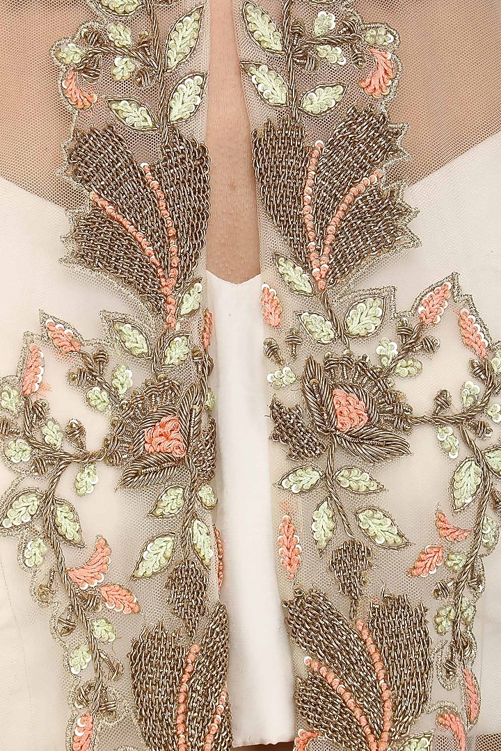Ivory floral embroidered cape and peach skirt set available only at Pernia's Pop Up Shop.