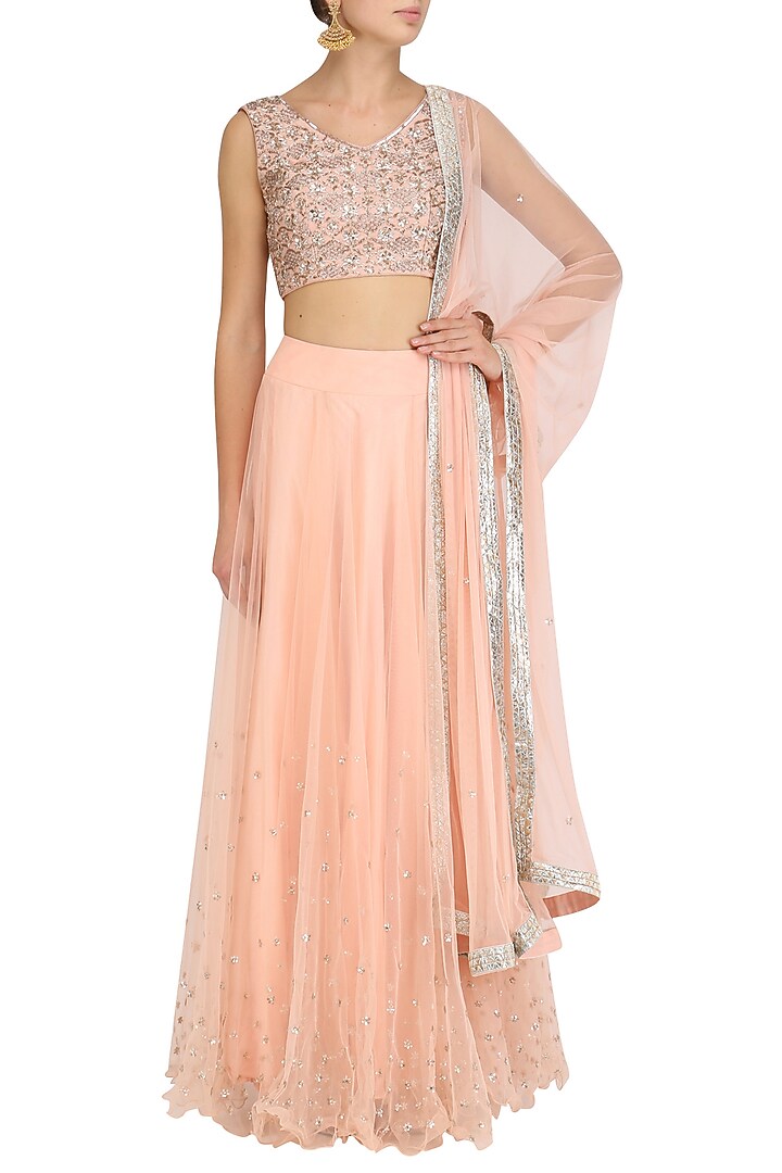 Pink embroidered blouse and lehenga skirt set available only at Pernia's Pop Up Shop.