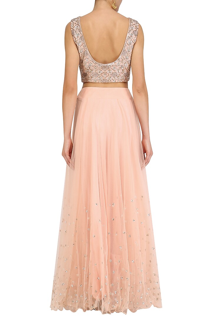 Pink embroidered blouse and lehenga skirt set available only at Pernia's Pop Up Shop.