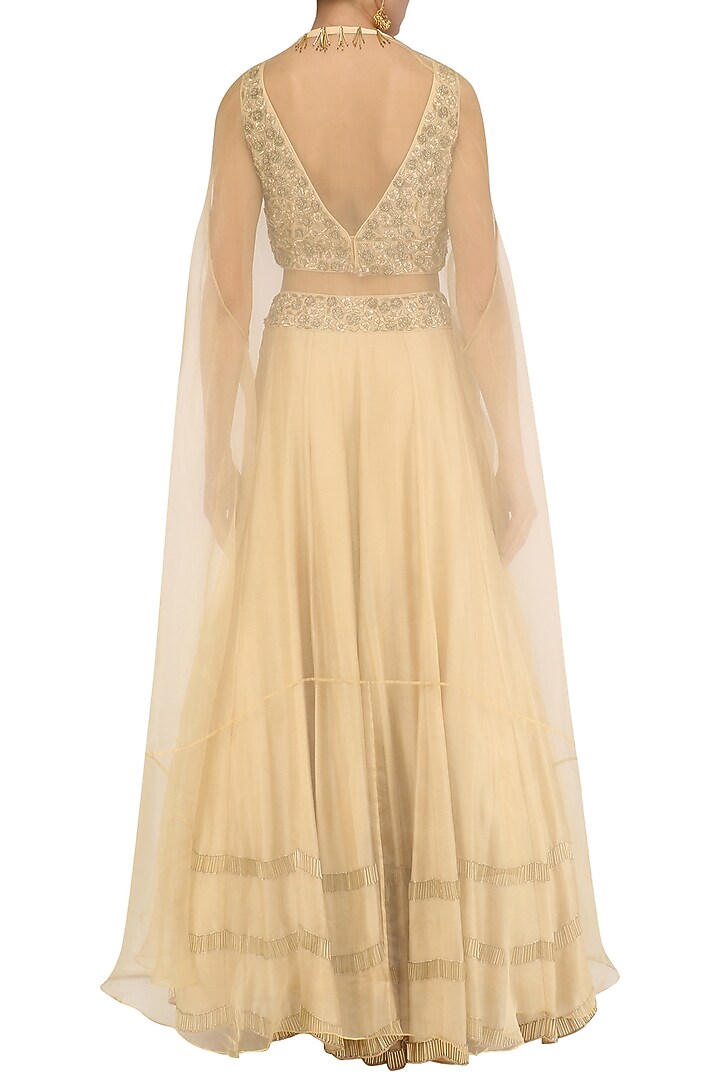 Gold tasseled blouse, lehenga skirt and cape set available only at Pernia's Pop Up Shop.