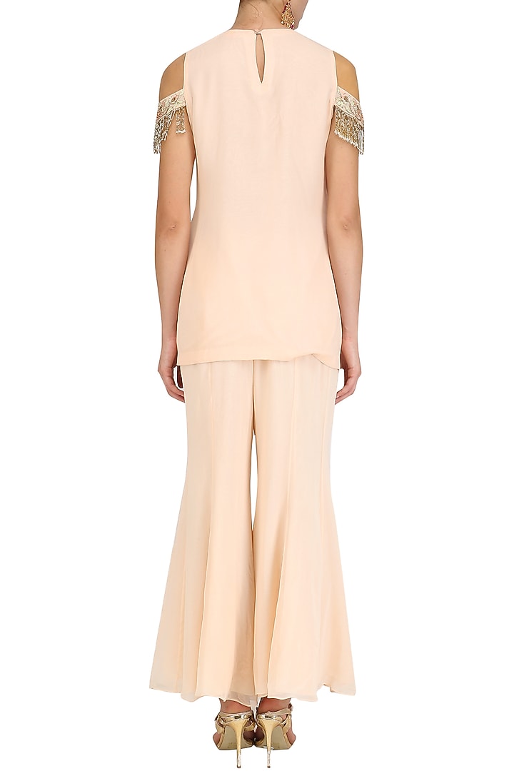 Peach floral embroidered kurta and sharara pants set available only at Pernia's Pop Up Shop.