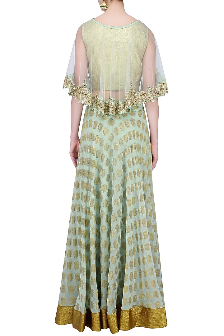 Mint green floral applique brocade lehenga set with mirror work cape available only at Pernia's Pop Up Shop.