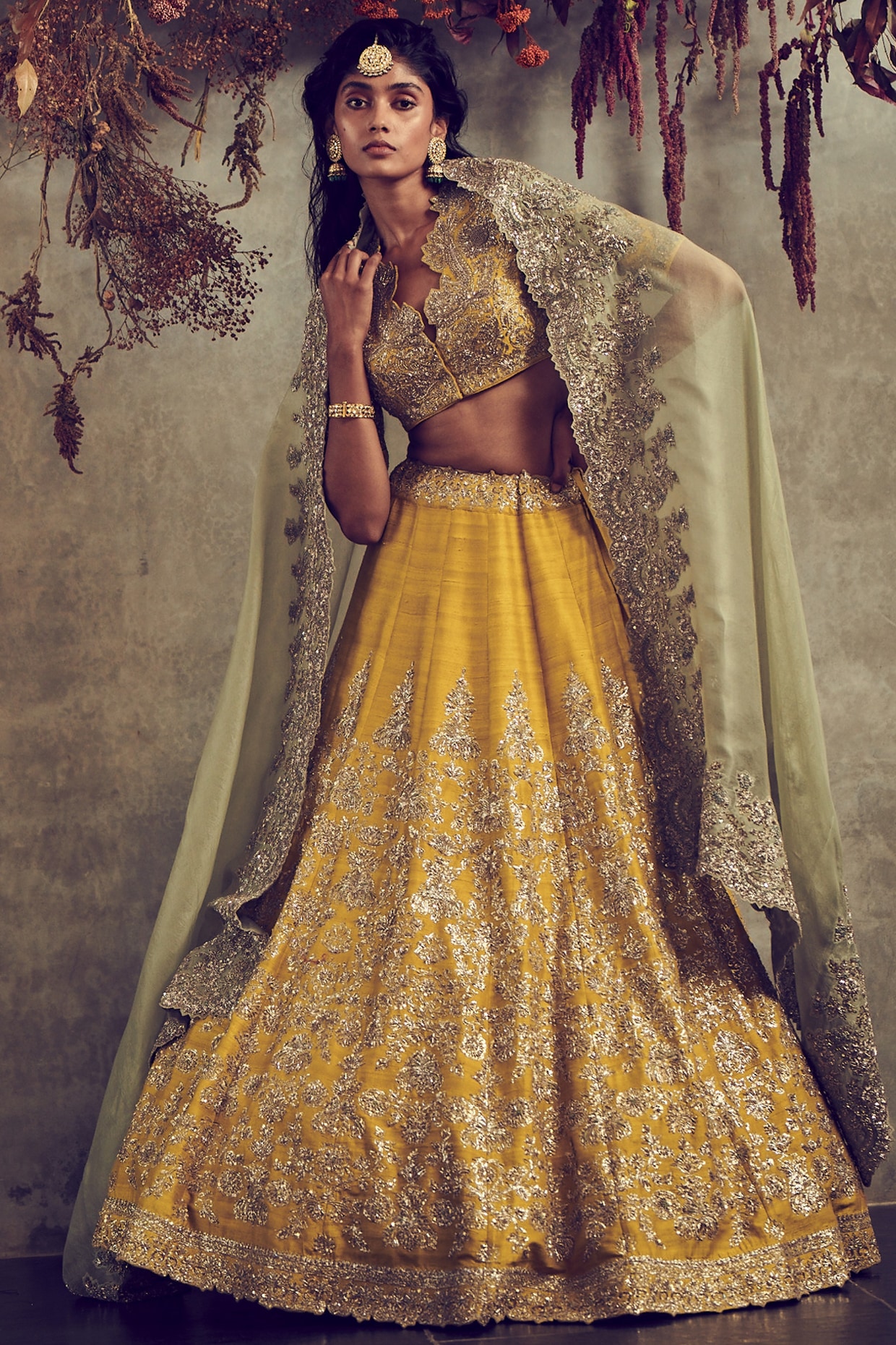 Golden Yellow Badla Work Net Bridal Lehenga Choli