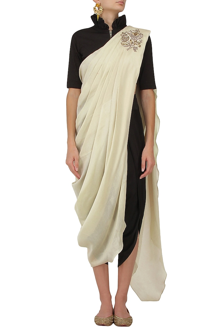 Ivory pre stitched saree with black crop top and dhoti pants available only at Pernia's Pop Up Shop.