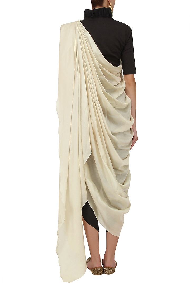 Ivory pre stitched saree with black crop top and dhoti pants available only at Pernia's Pop Up Shop.