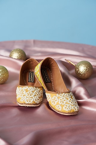 Yellow & Ivory Cotton Silk Thread Embellished Juttis For Girls by Jekwats