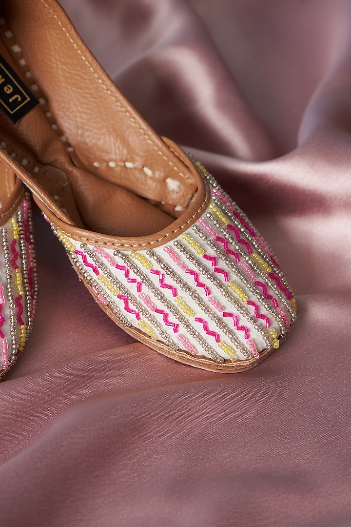 Ivory Cotton Silk Beads Embroidered Juttis For Girls by Jekwats at Pernia's Pop Up Shop