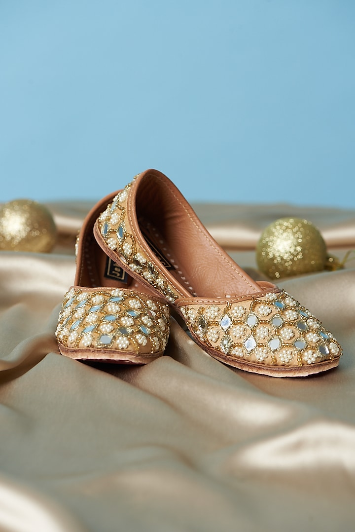 Golden Cotton Silk Mirror Hand Embroidered Juttis For Girls by Jekwats at Pernia's Pop Up Shop