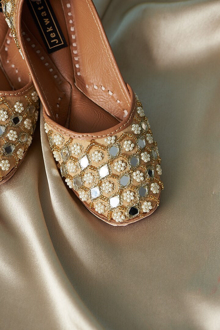 Golden Cotton Silk Mirror Hand Embroidered Juttis For Girls by Jekwats at Pernia's Pop Up Shop