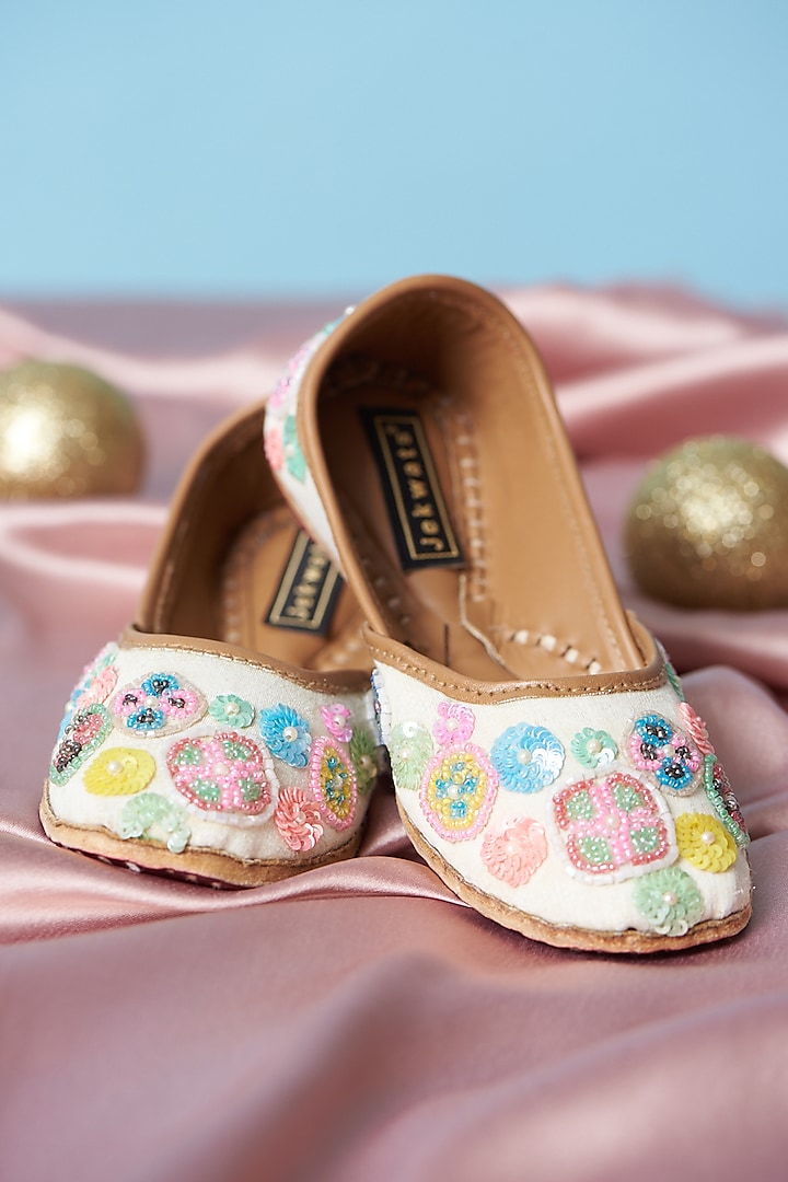 Ivory Pure Leather Sequins Embroidered Juttis For Girls by Jekwats