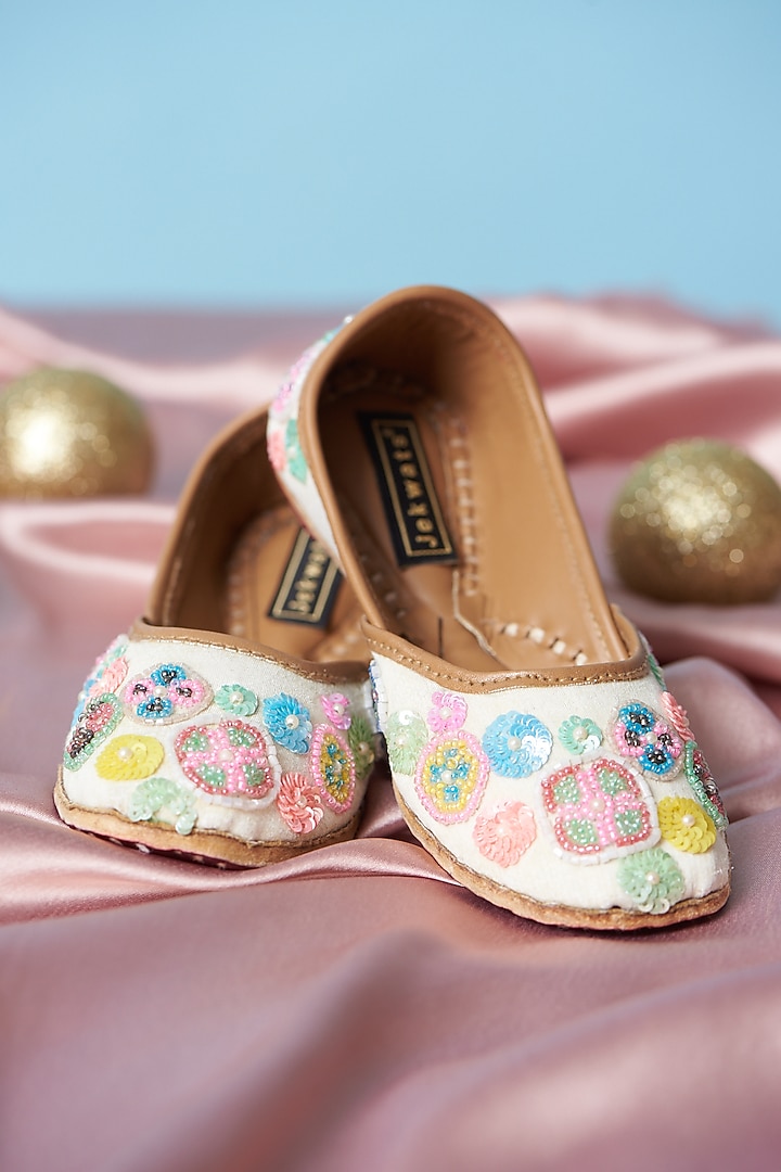 Ivory Pure Leather Sequins Embroidered Juttis For Girls by Jekwats at Pernia's Pop Up Shop