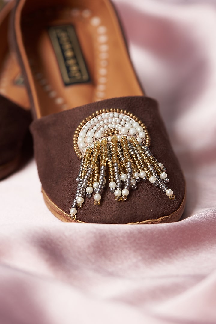 Brown Pure Leather Tassels Embellished Handcrafted Juttis For Girls by Jekwats at Pernia's Pop Up Shop