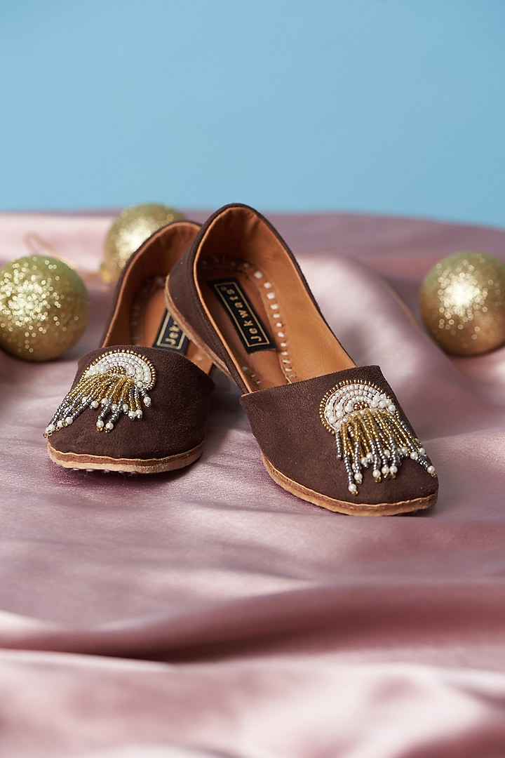 Brown Pure Leather Tassels Embellished Handcrafted Juttis For Girls by Jekwats at Pernia's Pop Up Shop