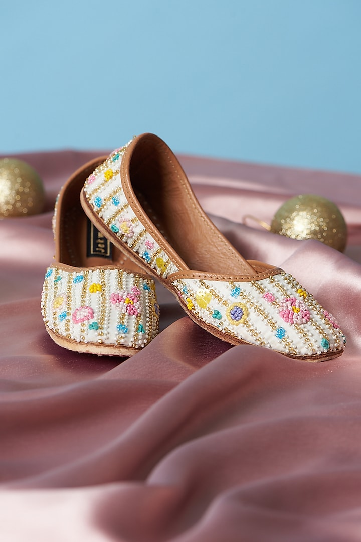 Ivory Pure Leather Beads Embroidered Juttis For Girls by Jekwats at Pernia's Pop Up Shop