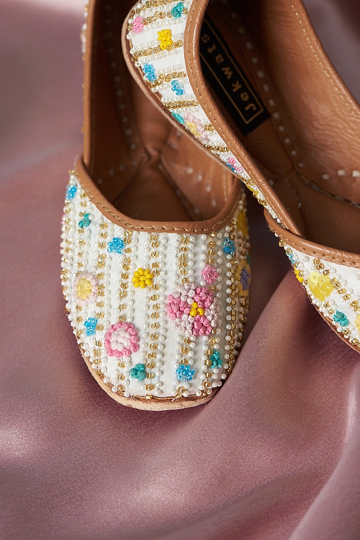 Ivory Pure Leather Beads Embroidered Juttis For Girls by Jekwats at Pernia's Pop Up Shop