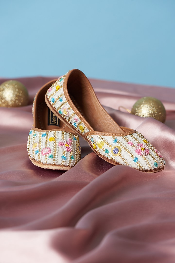 Ivory Pure Leather Beads Embroidered Juttis For Girls by Jekwats at Pernia's Pop Up Shop