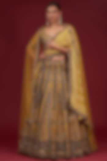 Mustard Raw Silk Aari Embroidered Bridal Lehenga Set by Jigar Mali at Pernia's Pop Up Shop