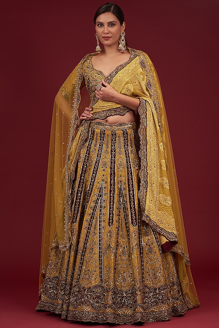 Mustard Raw Silk Aari Embroidered Bridal Lehenga Set by Jigar Mali at Pernia's Pop Up Shop