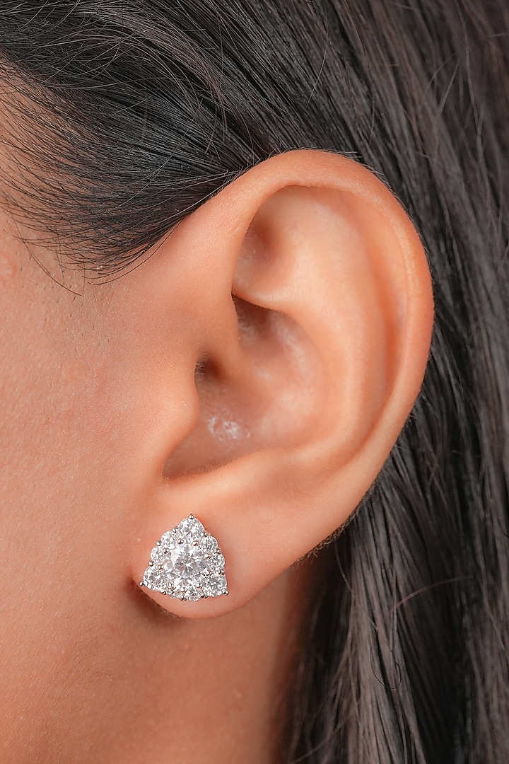 White Finish Zircon Triangle Stud Earrings In Sterling Silver by Johori at Pernia's Pop Up Shop