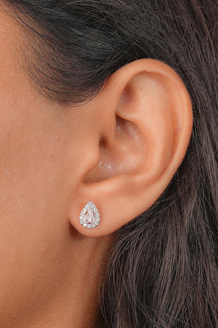 White Finish Zircon Triangle Stud Earrings In Sterling Silver by Johori at Pernia's Pop Up Shop