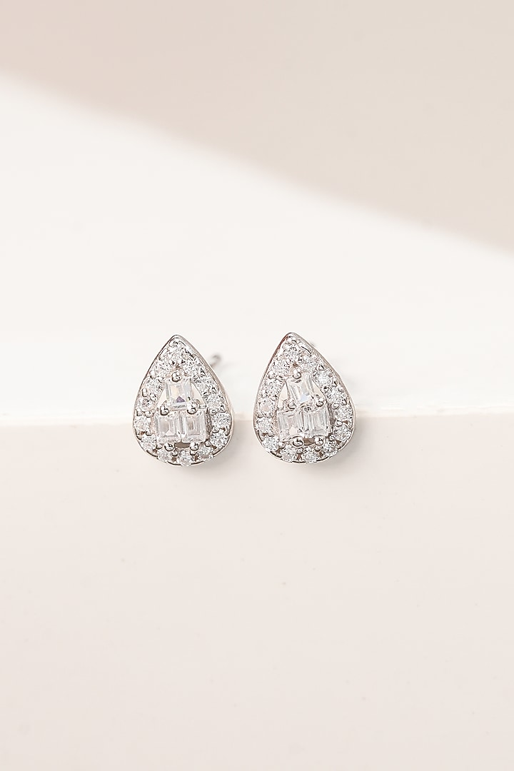 White Finish Zircon Triangle Stud Earrings In Sterling Silver by Johori at Pernia's Pop Up Shop
