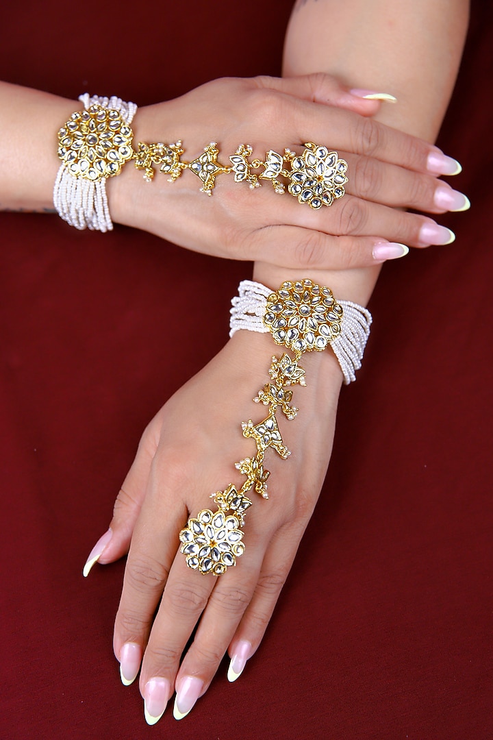 Gold Finish Kundan Polki Hathphool (Set Of 2) by Just Jewellery at Pernia's Pop Up Shop