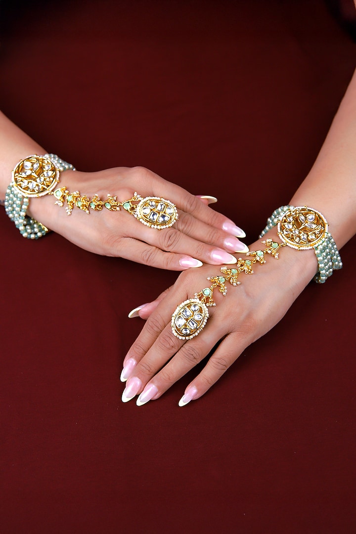 Gold Finish Mint Green Kundan Polki Hathphool (Set Of 2) by Just Jewellery at Pernia's Pop Up Shop