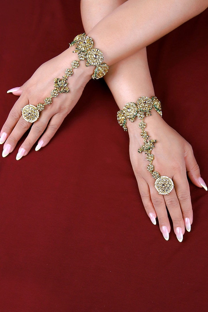 Gold Finish Kundan Polki Hathphool (Set Of 2) by Just Jewellery at Pernia's Pop Up Shop