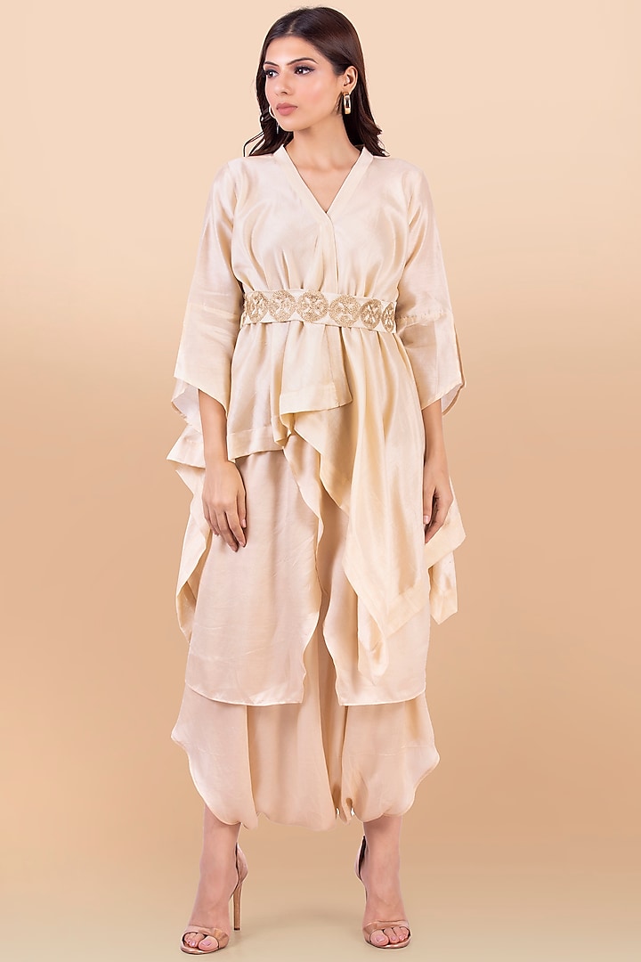 Cream Modal Satin Dhoti Set With Belt by Jajobaa at Pernia's Pop Up Shop