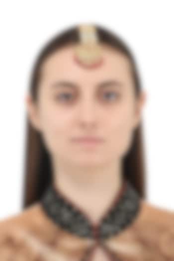 Gold plated red thewa crescent shaped maangtika available only at Pernia's Pop Up Shop.