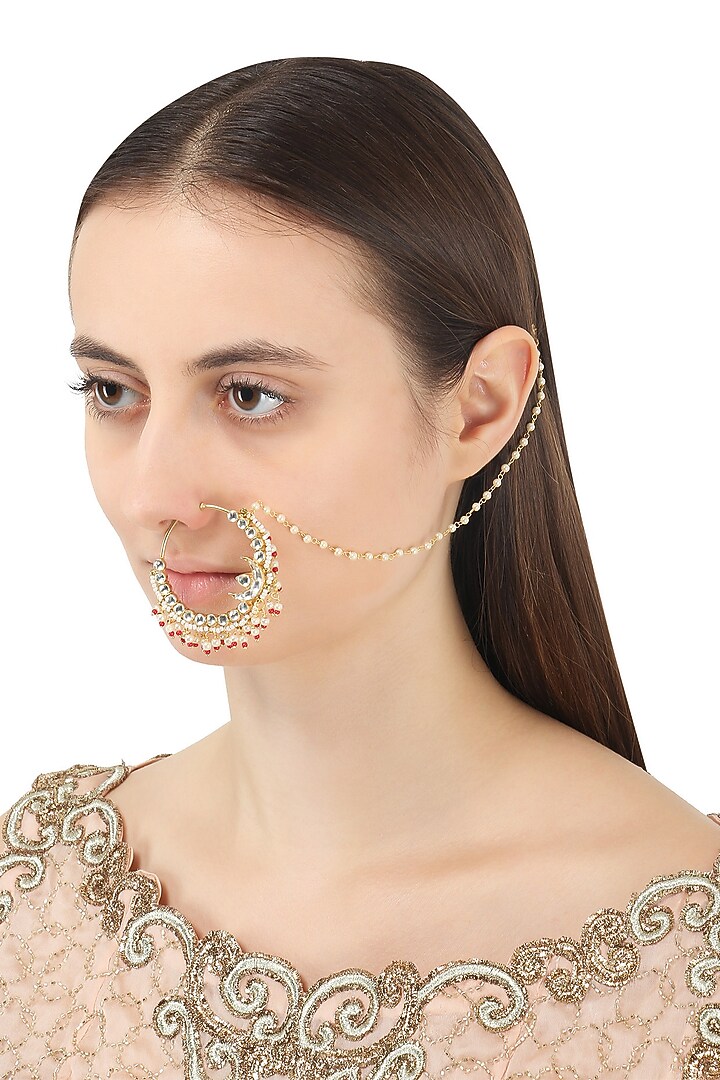 Gold plated jadtar and red beads nosering available only at Pernia's Pop Up Shop.