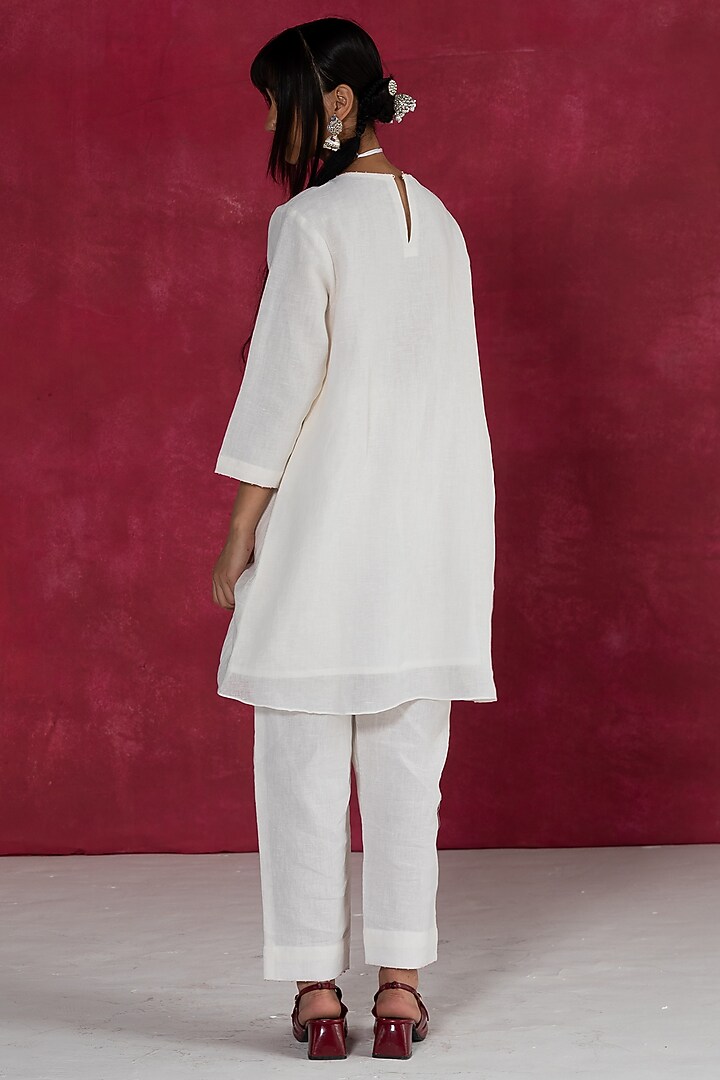 Ivory Linen Bullion Knot Embroidered Pleated Kurta Set by Journal by Pranay at Pernia's Pop Up Shop