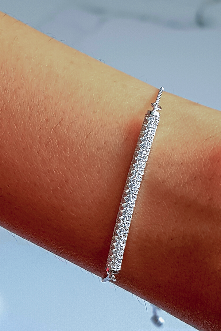 White Finish Cubic Zirconia Adjustable Bracelet by JewelitbySZ at Pernia's Pop Up Shop