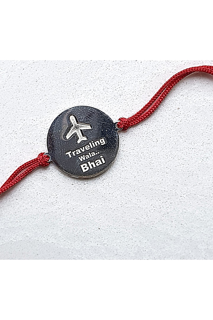 White Finish Travel Lover Bracelet Rakhi by JewelitbySZ