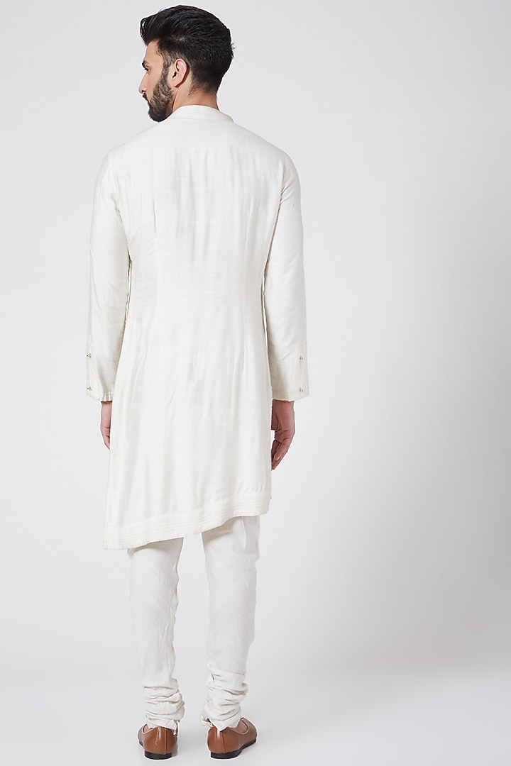 Ivory Asymmetric Kurta Set by Jatin Malik at Pernia's Pop Up Shop