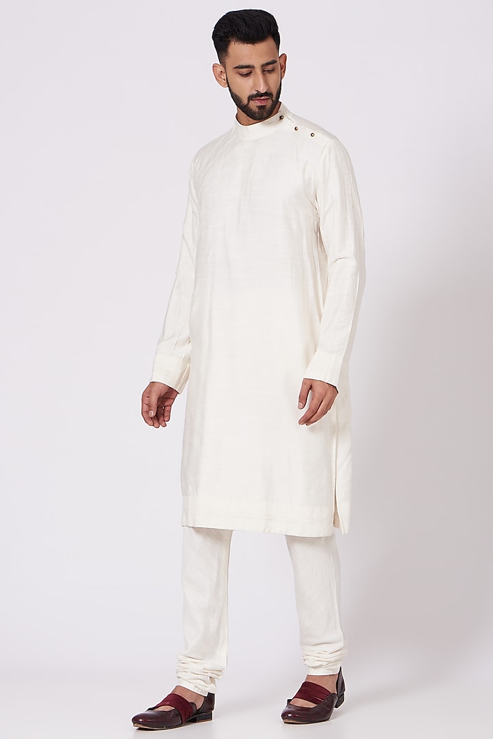 Ivory Slub Silk Asymmetrical Kurta Set by Jatin Malik