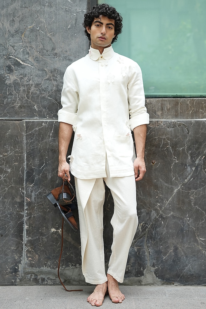 Ivory Textured Fabric Side Flap Trousers by Jatin Malik at Pernia's Pop Up Shop