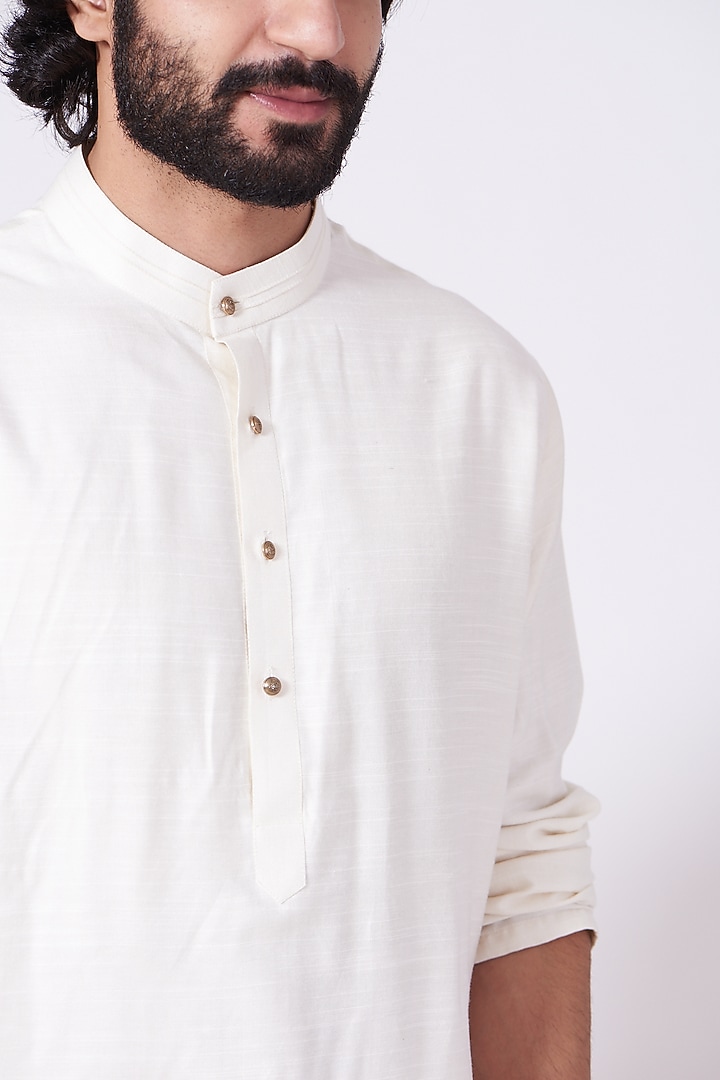 Ivory Slub Silk Pintucked Kurta Set by Jatin Malik at Pernia's Pop Up Shop