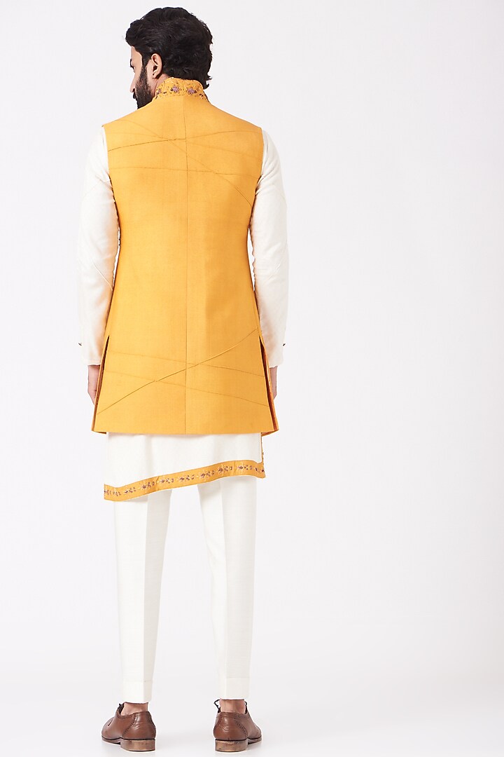 Ivory Kurta Set With Mustard Shrug by Jatin Malik at Pernia's Pop Up Shop