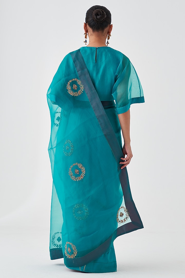 Turquoise Organza Embroidered Wedding Saree by JANKI INDIA at Pernia's Pop Up Shop