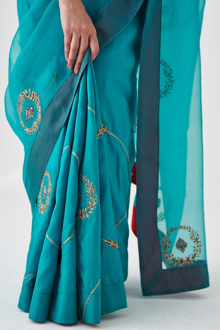 Turquoise Organza Embroidered Wedding Saree by JANKI INDIA at Pernia's Pop Up Shop