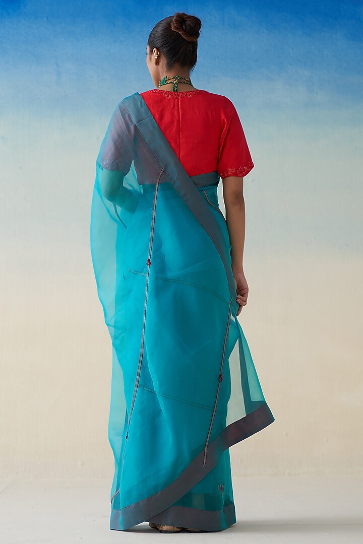 Turquoise Organza Embroidered Wedding Saree by JANKI INDIA at Pernia's Pop Up Shop